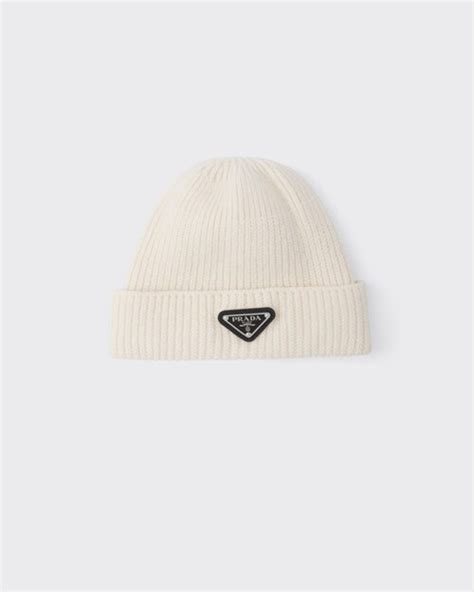 white prada beanie.